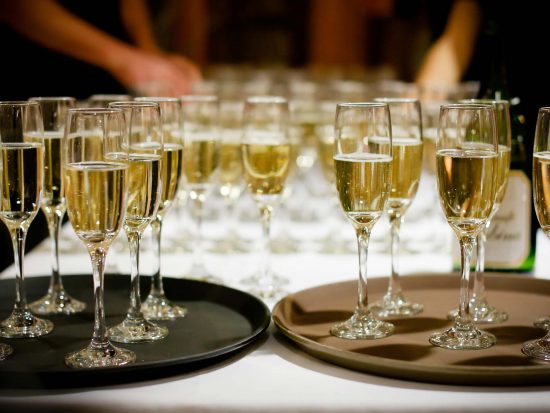 My PA Online virtual assistant UK entertainment and exhibitions image of champagne flutes at a corporate hospitality event.